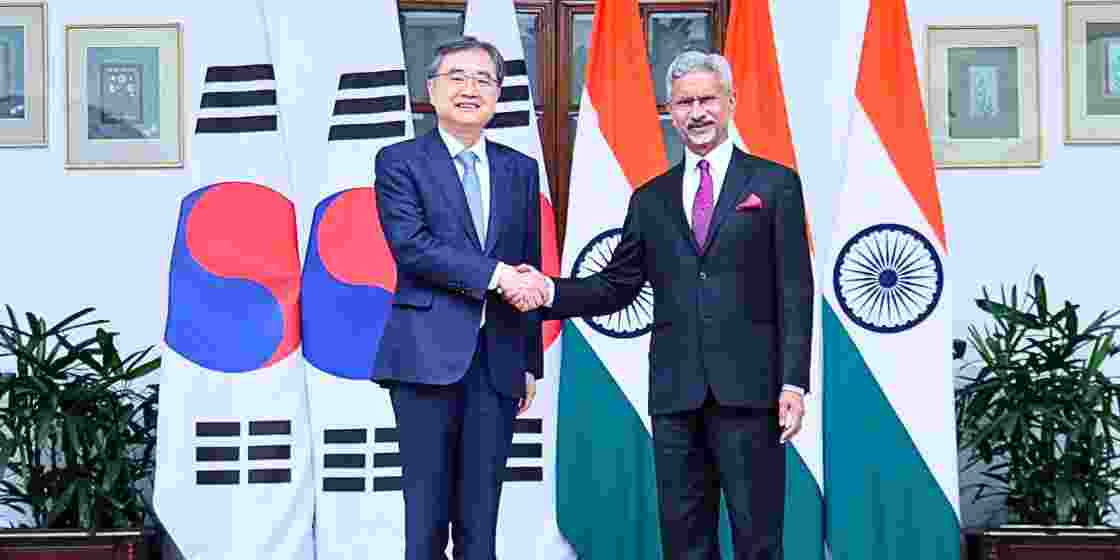 External Affairs Minister S Jaishankar and South Korean Foreign Minister Cho Hyun shake hands.