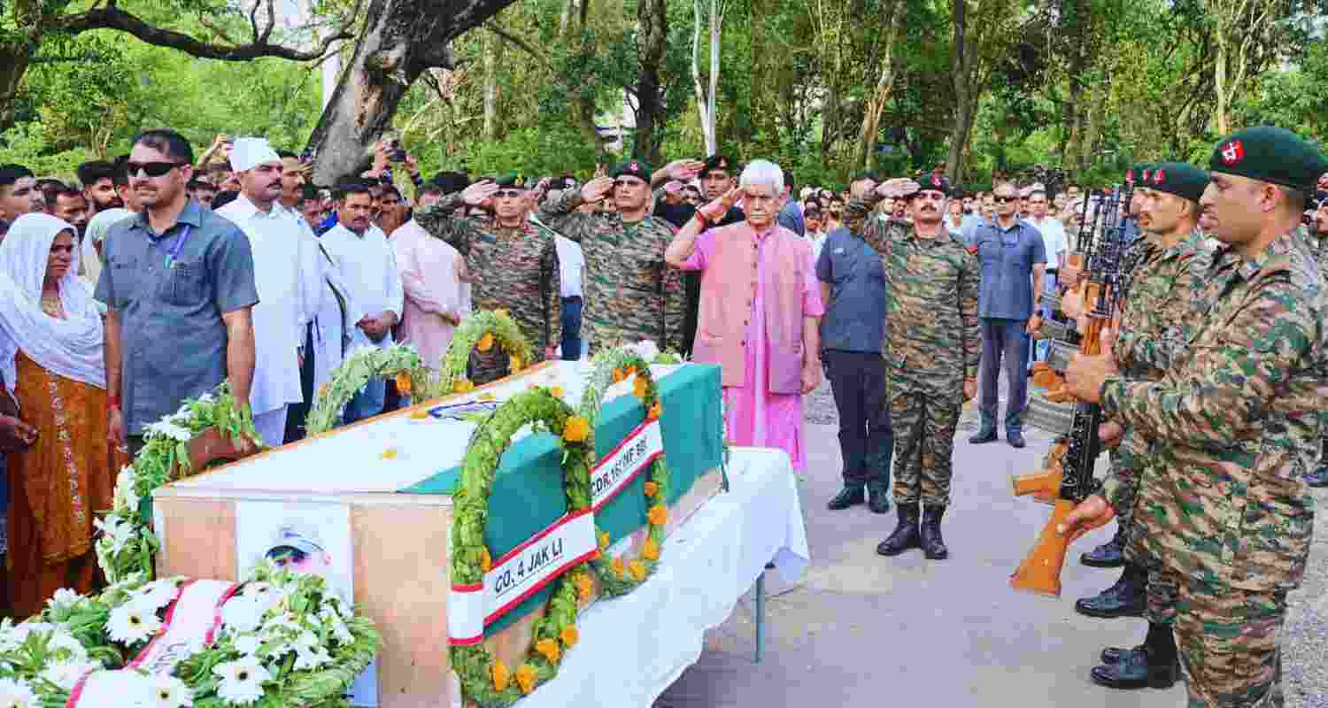 JKAS officer cremated with state honours; LG visits family