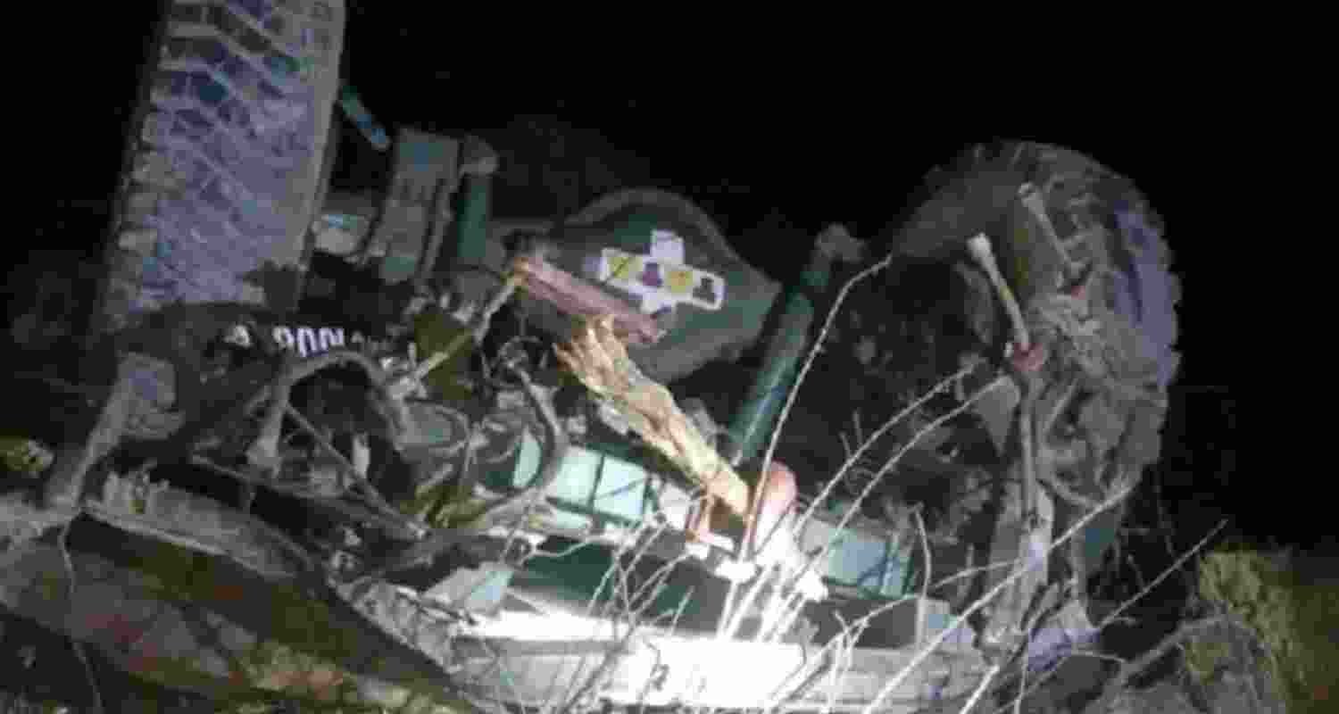 : Wreckage of the Army vehicle after it skidded off the road and rolled down into a gorge, in Jammu and Kashmir's Poonch district, Tuesday, Dec. 24, 2024. At least five soldiers were killed and five others injured in the accident, according to officials.