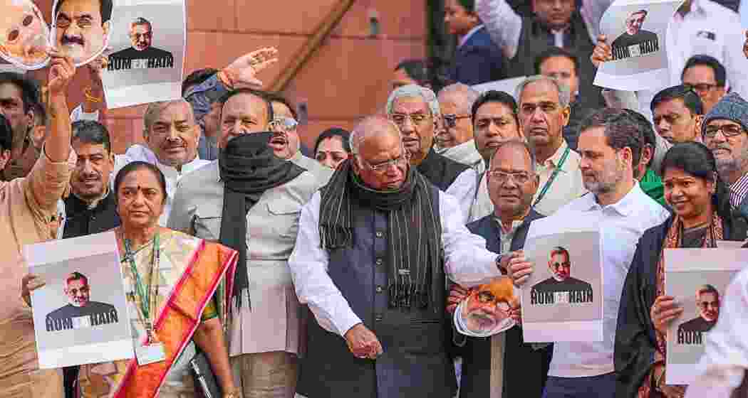 LoP in the Rajya Sabha Mallikarjun Kharge with LoP in the Lok Sabha Rahul Gandhi and other opposition MPs stages a protest over the Adani issue and Manipur unrest during the Winter session of Parliament, in New Delhi, Monday, Dec. 9, 2024