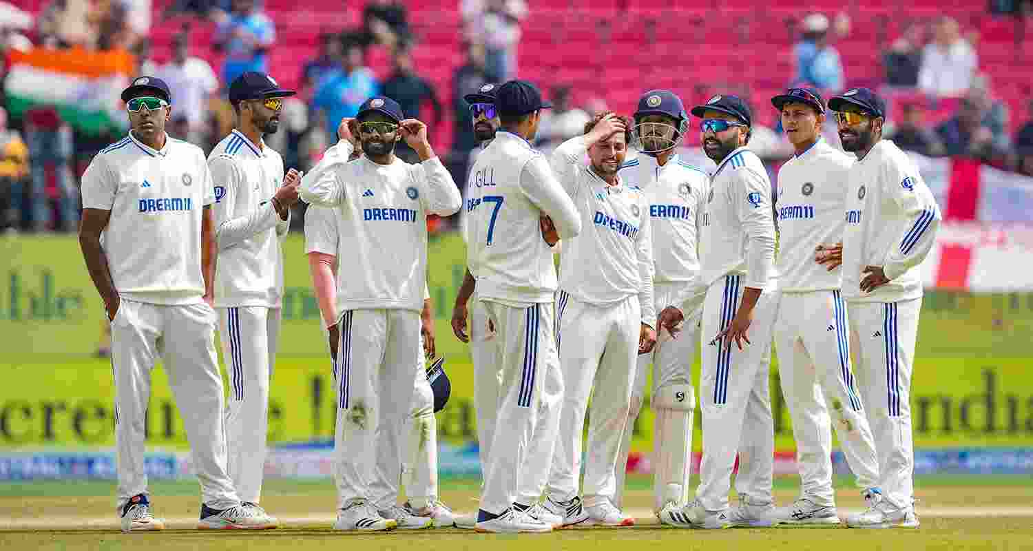 Indian players celebrating Kuldeep Yadav's fifer on the first day of 5th Test between India and Pakistan at Dharamshala, Himachal Pradesh.