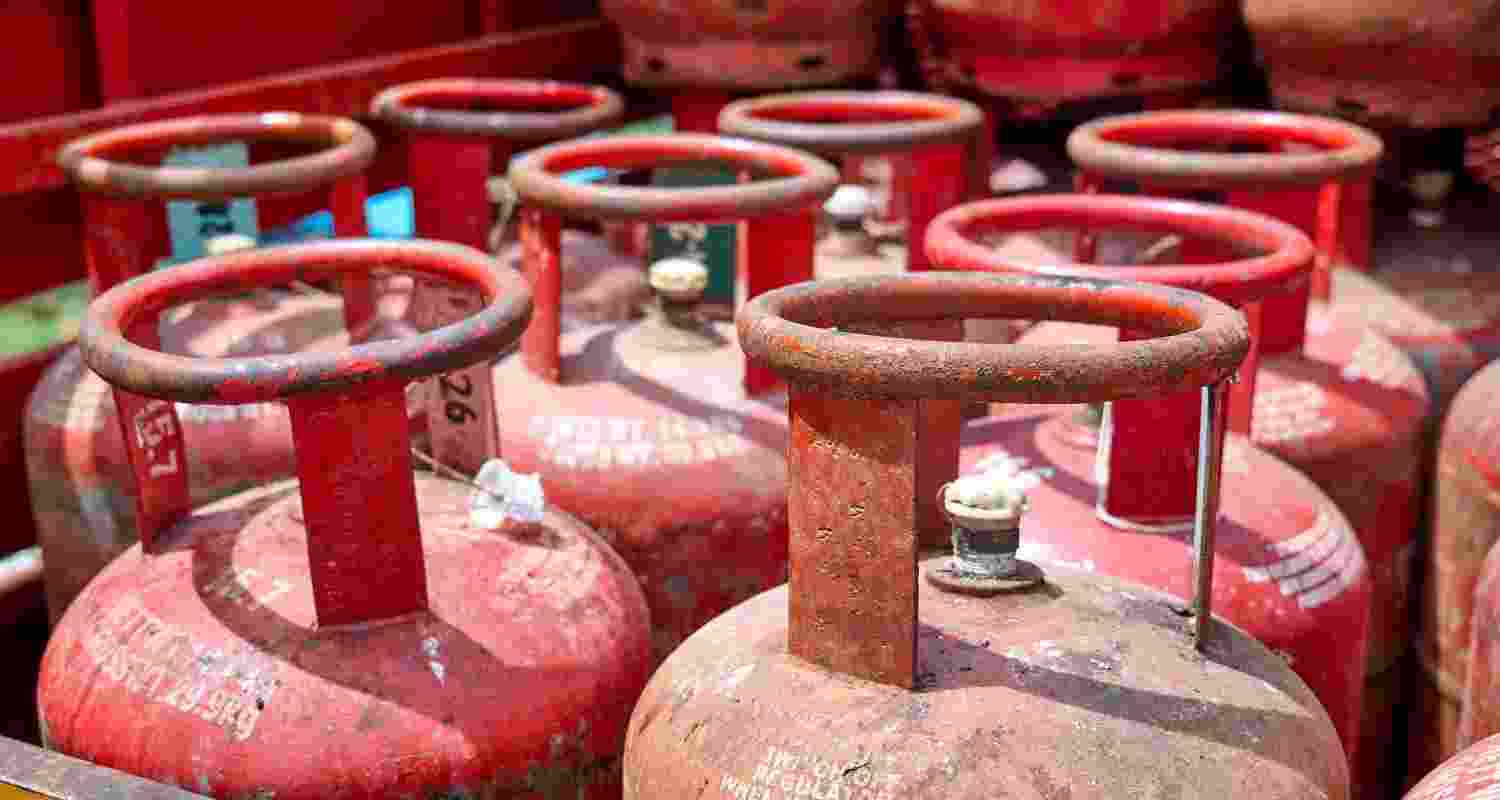 An image of red-coloured LPG cylinders, which are commonly found across the nation.