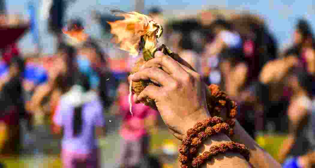  A devotee offers prayers after taking a holy dip during the ongoing Mahakumbh Mela, at Sangam in Prayagraj on Sunday, Feb. 23, 2025. 