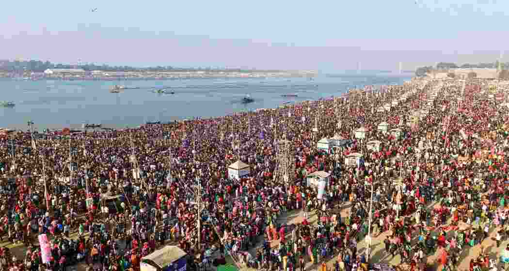 An aerial view of devotees taking a holy dip at Sangam, during the ongoing Maha Kumbh Mela festival, in Prayagraj. 