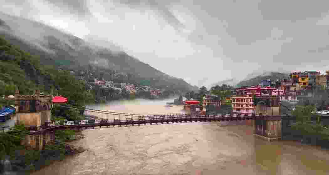 The Beas River in spate near Mandi, Himachal Pradesh, after torrential downpours triggered a red alert and fears of flash floods and landslides in the region on Monday.