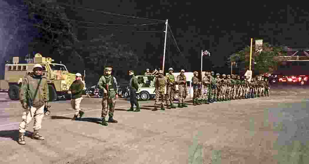 Security personnel stand guard following imposition of President's rule in the state, in Imphal, Manipur, Thursday, Feb. 13, 2025. Security agencies have been put on high alert in the state to counter any mischief by banned terror groups here following imposition of President's rule in the state, officials said Thursday. 