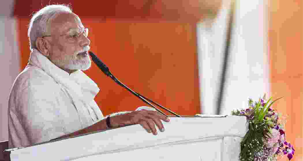 Prime Minister Narendra Modi addresses a public meeting, in Varanasi.