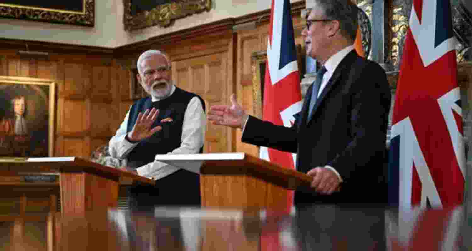 India-UK Trade Deal: Keir Starmer, UK prime minister, right, and Narendra Modi, India's prime minister, during a news conference after signing a free trade agreement at Chequers near Aylesbury, UK.