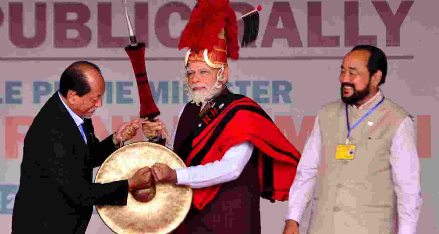 Nagaland Chief Minister Neiphiu Rio presents Naga traditional dress to Prime Minister Narendra Modi at a public rally ahead in Nagaland's Chumukedima district. File photo.