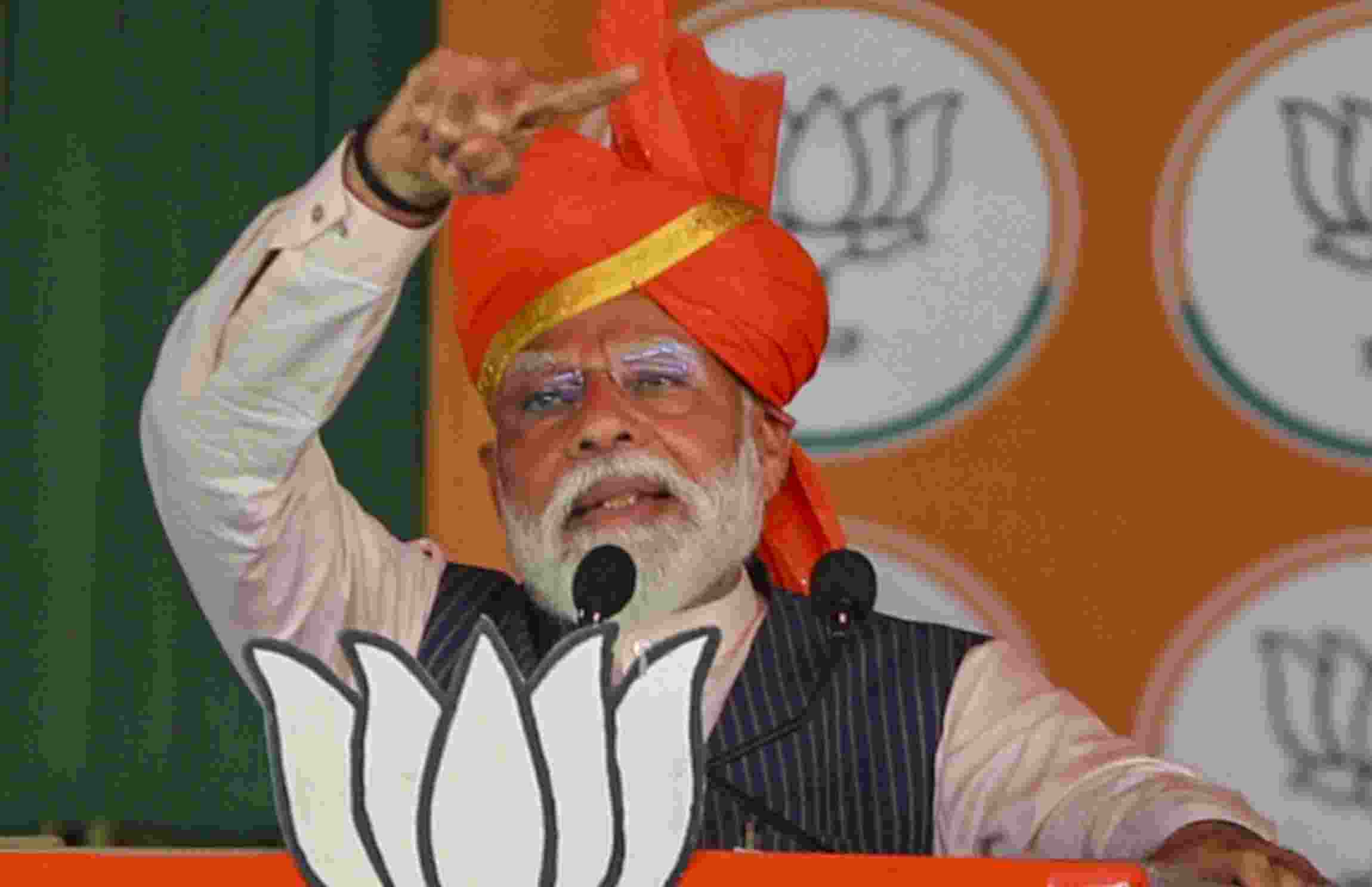 Assembly elections will be held in J&K, which will get statehood, he declares at Udhampur rally to support BJP candidates contesting LS polls.