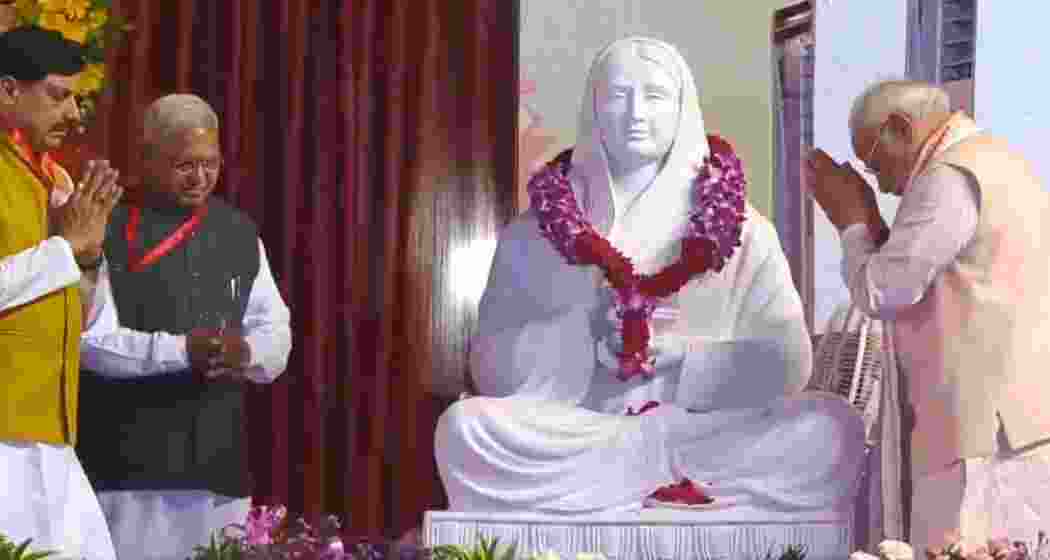 Prime Minister Narendra Modi pays floral tribute to Ahilyabai Holkar at the 300th birth anniversary event in Bhopal, witnessed by Madhya Pradesh Chief Minister Shivraj Singh Chouhan and Governor Mangubhai Patel at Jamboree Maidan.