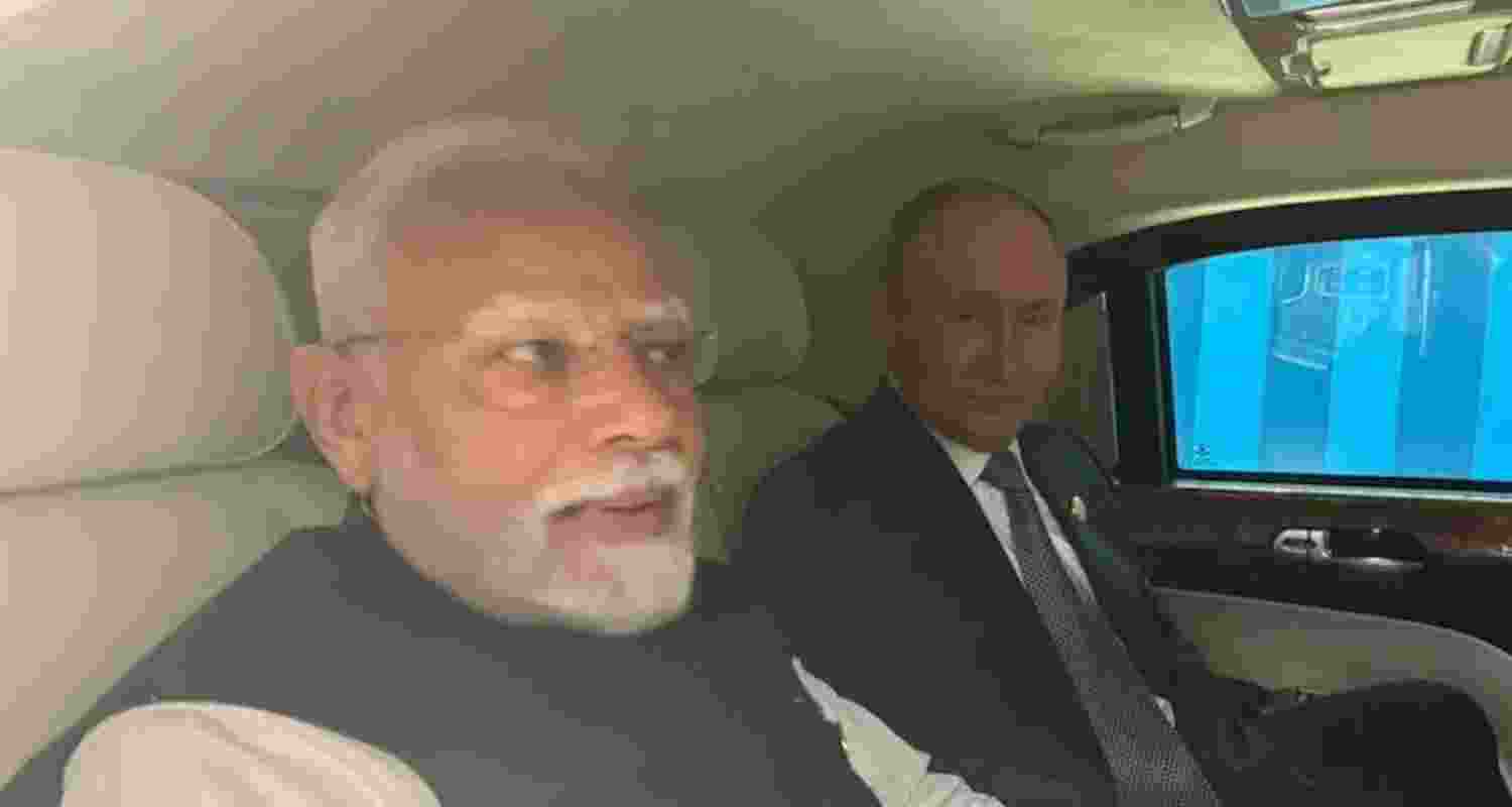 Prime Minister Narendra Modi and Russian President Vladimir Putin travel in the same car to the destination of their bilateral meeting in Tianjin, China.