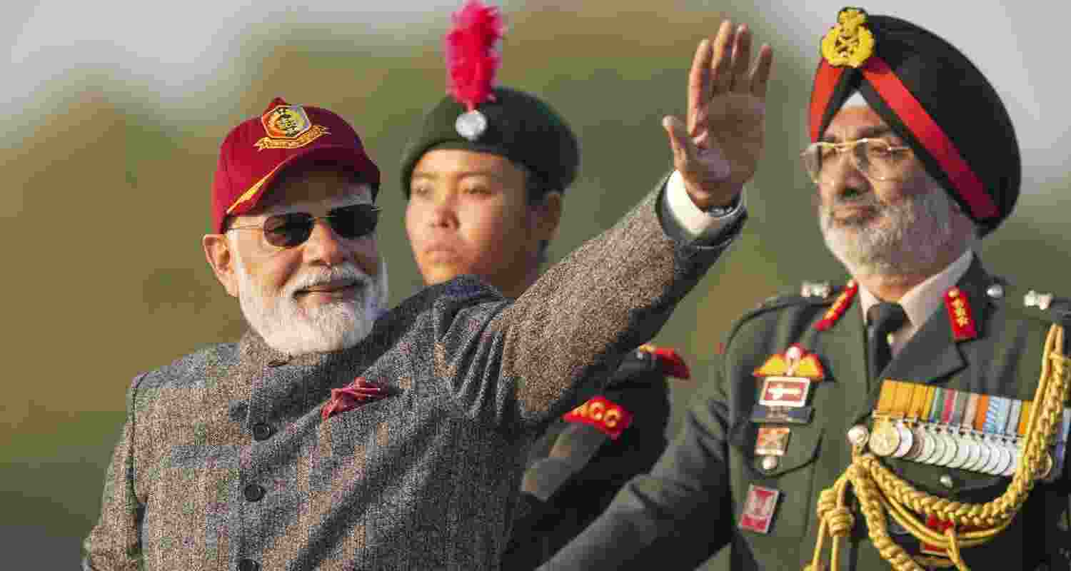 PM Modi waves to the audience at the NCC PM Rally in New Delhi, Monday.