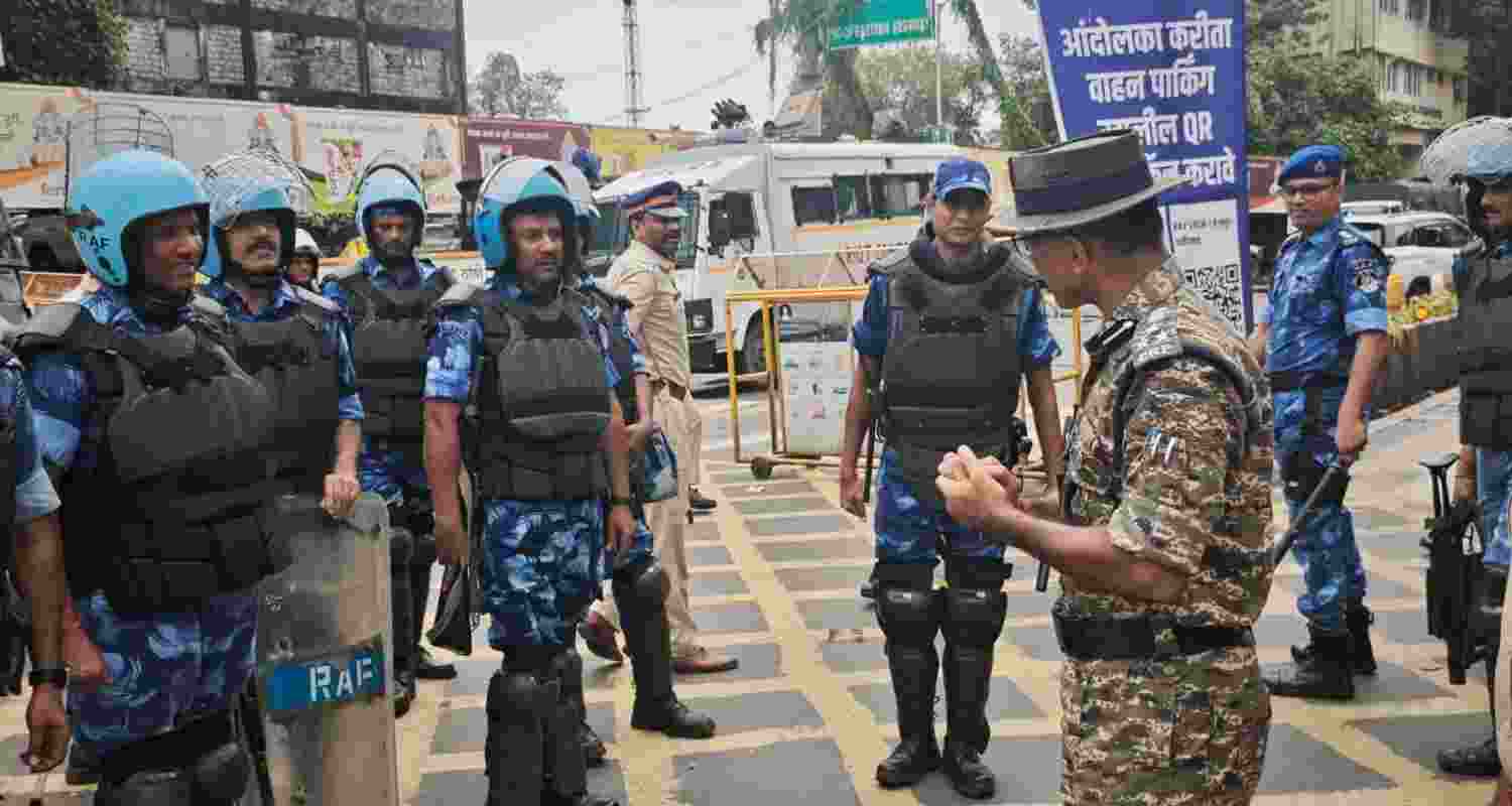 Heavy police deployment outside the CSMT in Mumbai.