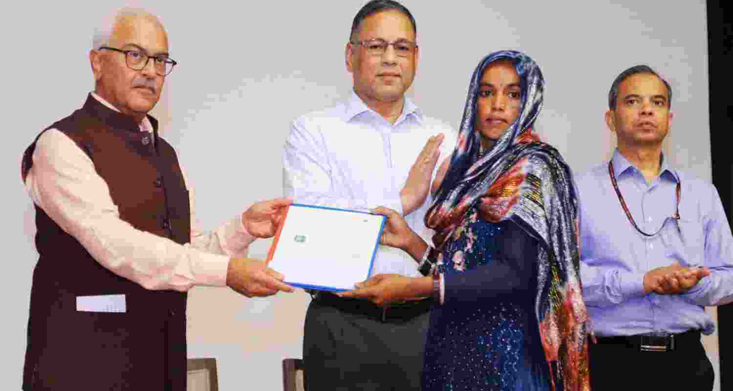 Union Home Secretary Ajay Kumar Bhalla hands over the first set of citizenship certificates under the Citizenship (Amendment) Act (CAA), in New Delhi on Wednesday, May 15, 2024.