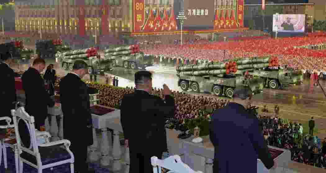 Kim receives a ceremonial salute during Pyongyang’s grand military parade, as troops and missile units march past to mark the 80th anniversary of the Workers’ Party.
