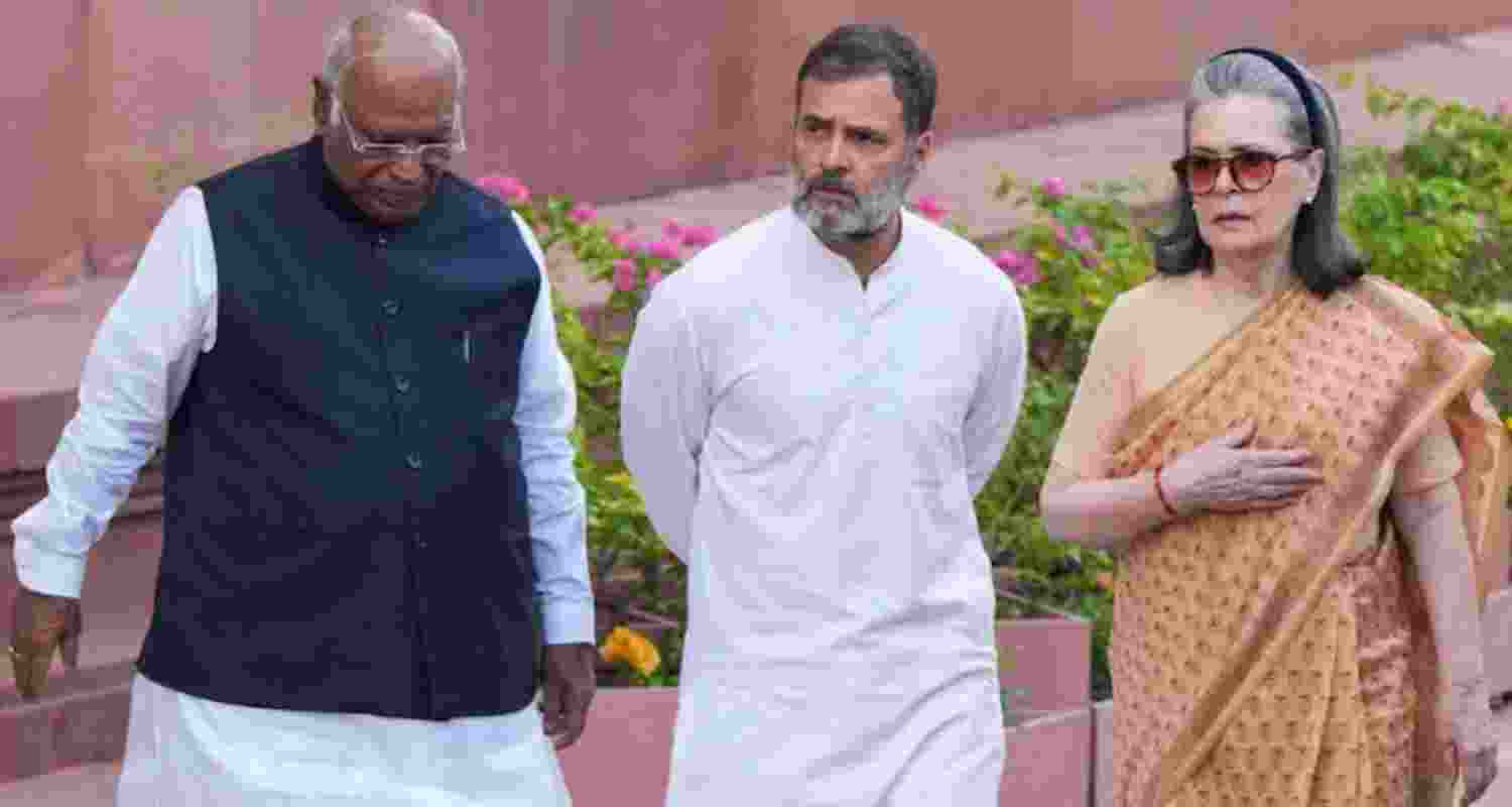A file photo of Congress President Mallikarjun Kharge with party leaders Sonia and Rahul Gandhi.