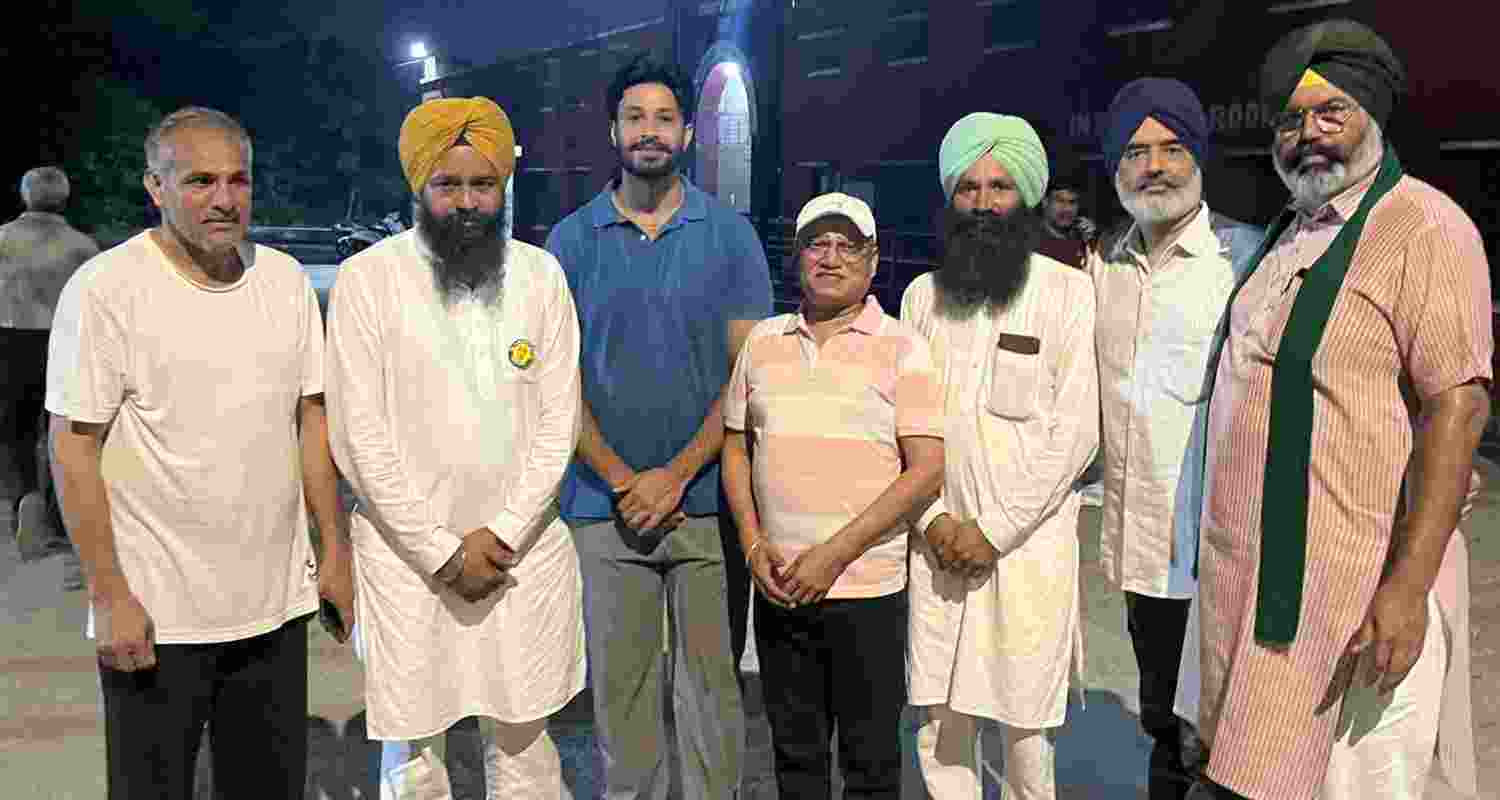 Navdeep Singh (third from left) with farmers after he walks out of jail. 