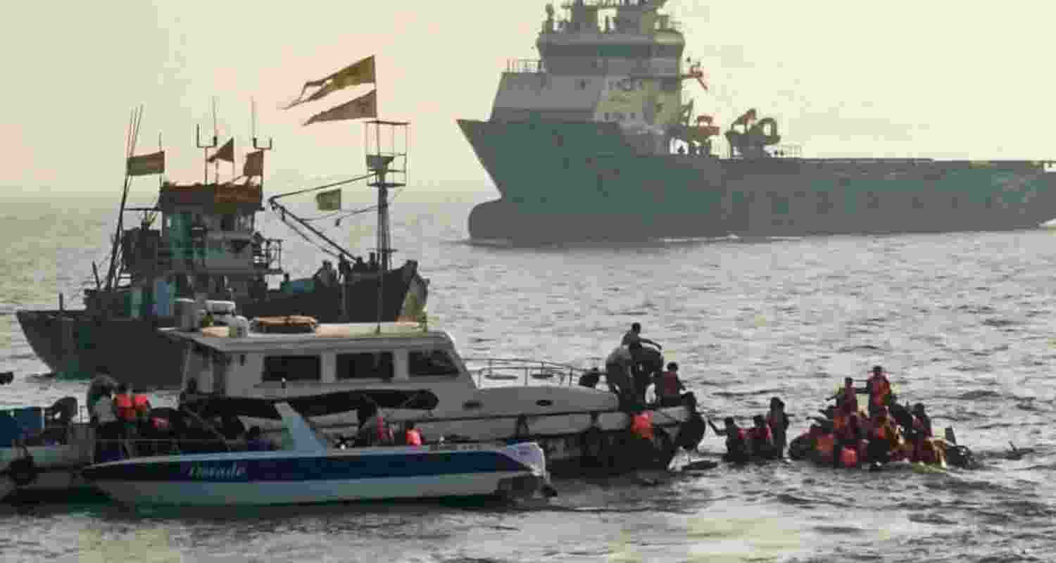 A coast guard vessel arrived on with rescue personnel to assist injured individuals.