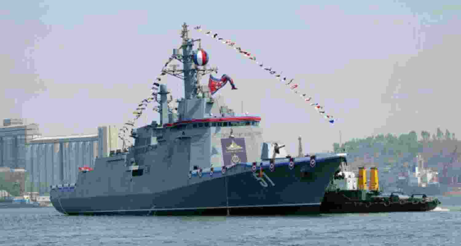 North Korea unveils new naval destroyer at Nampo port on April 25, in an image released by state media KCNA. 