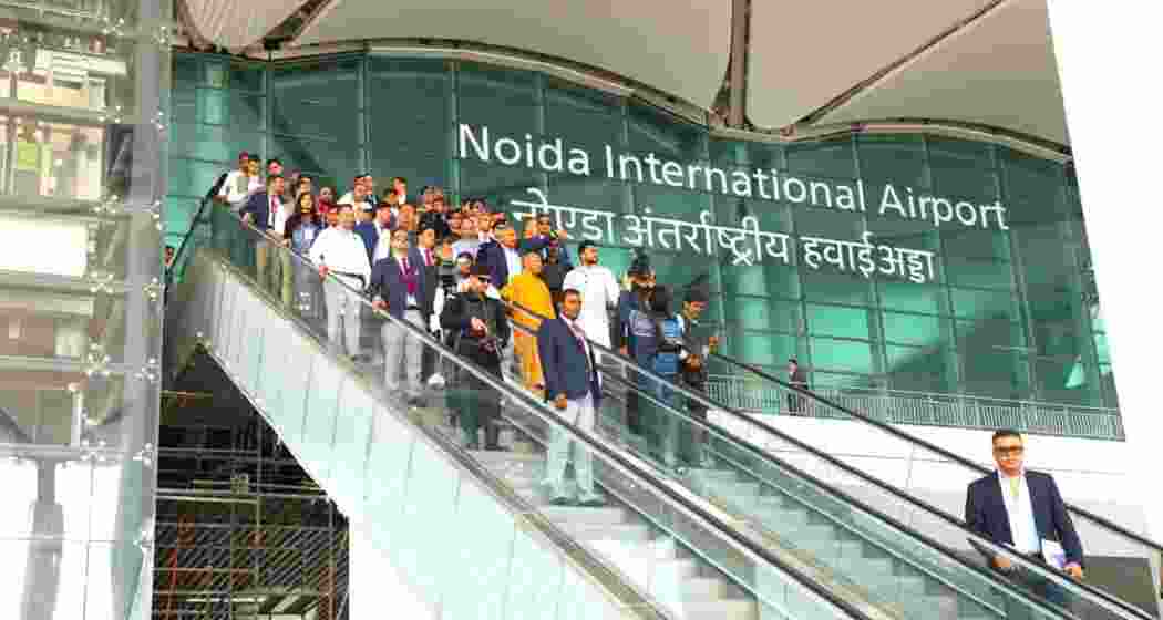 UP CM Yogi Adityanath and Civil Aviation Minister Kinjarapu Ram Mohan Naidu tour the Jewar airport along with officials.