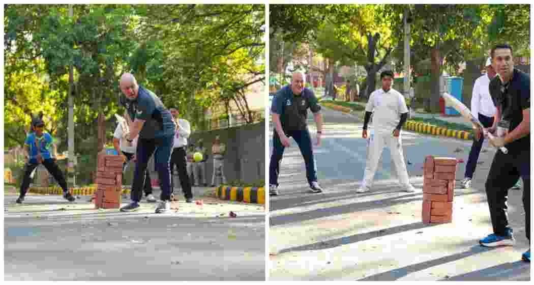 New Zealand Prime Minister Christopher Luxon shares a light moment playing cricket with children in Delhi, accompanied by former cricketer Ross Taylor, strengthening the sporting ties between India and New Zealand.