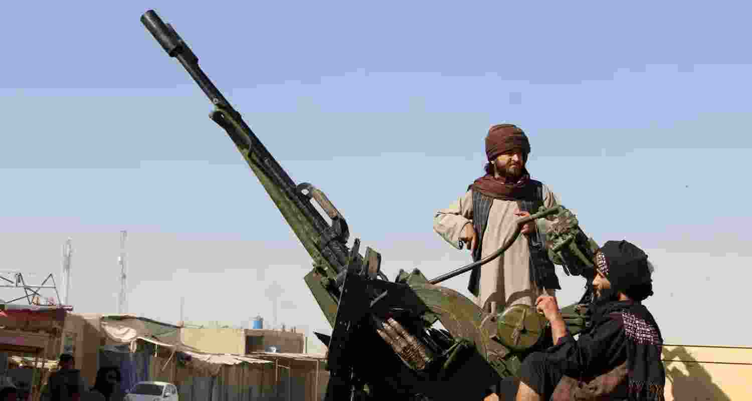 Taliban fighters patrol during cross-border clashes between Taliban security forces and Pakistani soldiers last week.