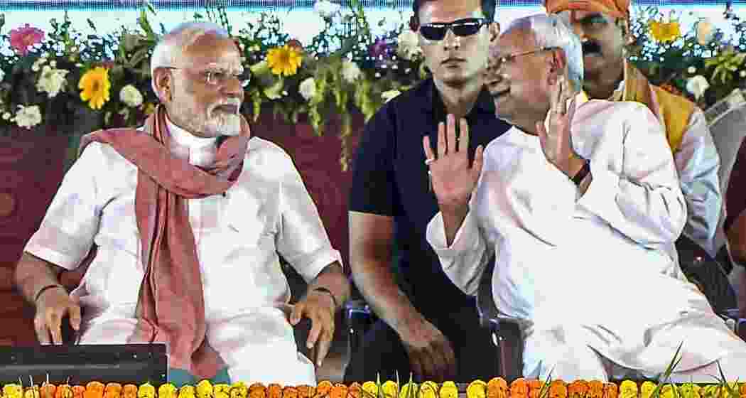 Prime Minister Narendra Modi with Bihar Chief Minister Nitish Kumar during the National Panchayati Raj Day programme, in Madhubani district, Bihar on Thursday. (PMO via PTI Photo) Prime Minister Narendra Modi with Bihar Chief Minister Nitish Kumar during the National Panchayati Raj Day programme, in Madhubani district, Bihar on Thursday. (PMO via PTI Photo)