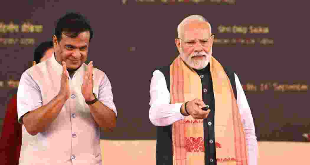 Prime Minister Narendra Modi with Assam Chief minister Himanta Biswa Sarma (L). (File photo)