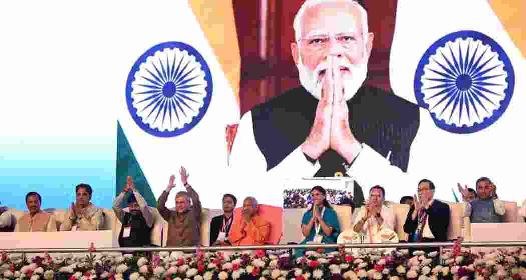 Prime Minister Narendra Modi virtually inaugurates the HCL-Foxconn semiconductor unit as Uttar Pradesh Chief Minister Yogi Adityanath and other leaders applaud at the YEIDA site.