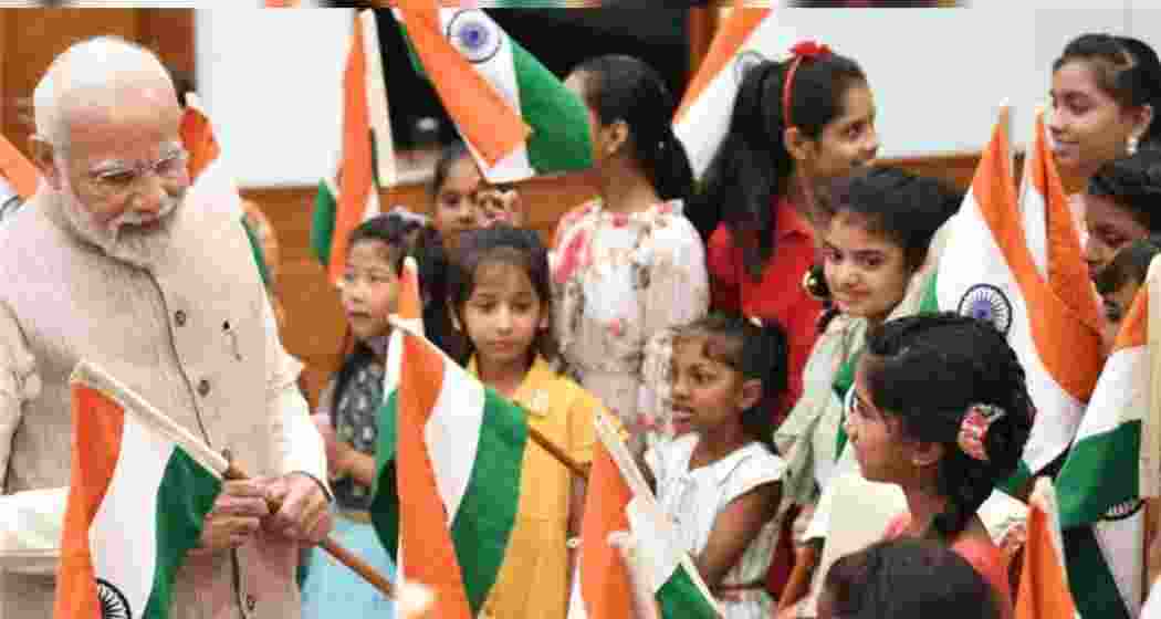 PM shares joyful moments with children.
