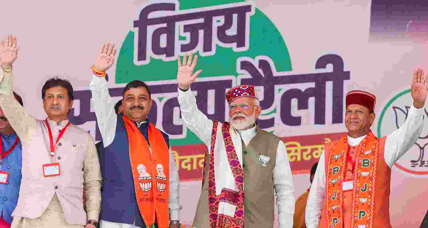 Prime Minister Narendra Modi and Himachal Pradesh BJP President Rajeev Bindal with other party leaders during a public meeting for Lok Sabha elections, in Sirmaur district, Friday. 