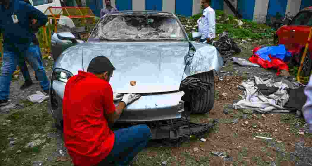 A team inspects the luxury car at the Yerwada Police Station in Pune back in 2024.