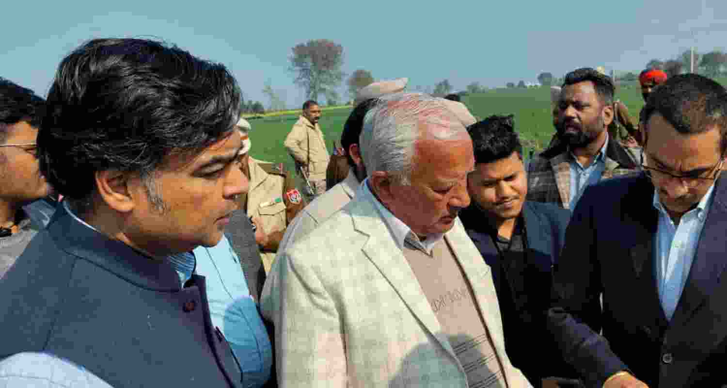 Punjab's Mining and Water Resources Minister, Barinder Kumar Goyal examining the area.