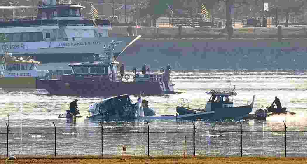 Search and rescue efforts seen around the wreckage site on the icy Potomac River for debris and remains after a midair collision near Reagan National Airport left 67 dead in America’s deadliest aviation disaster in decades.