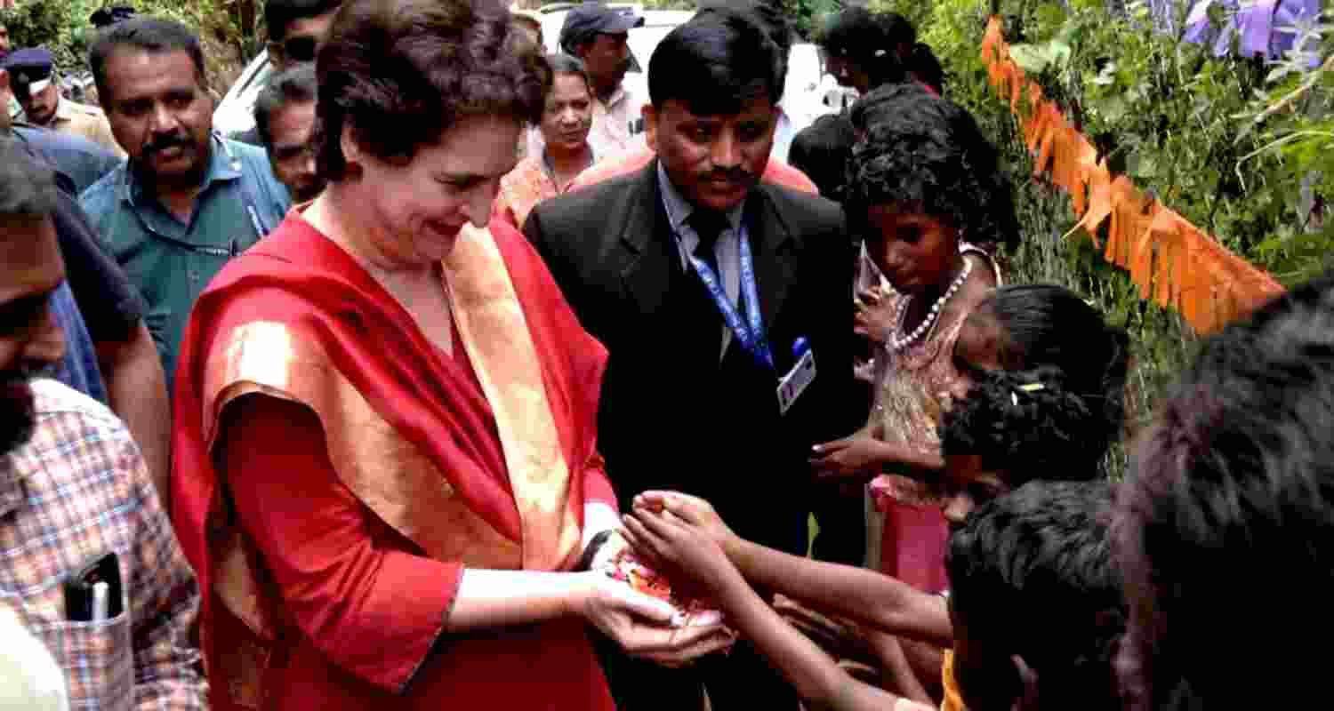 Congress MP Priyanka Gandhi Vadra interacts with locals, shakes hands with them and asks about the anganwadi. 