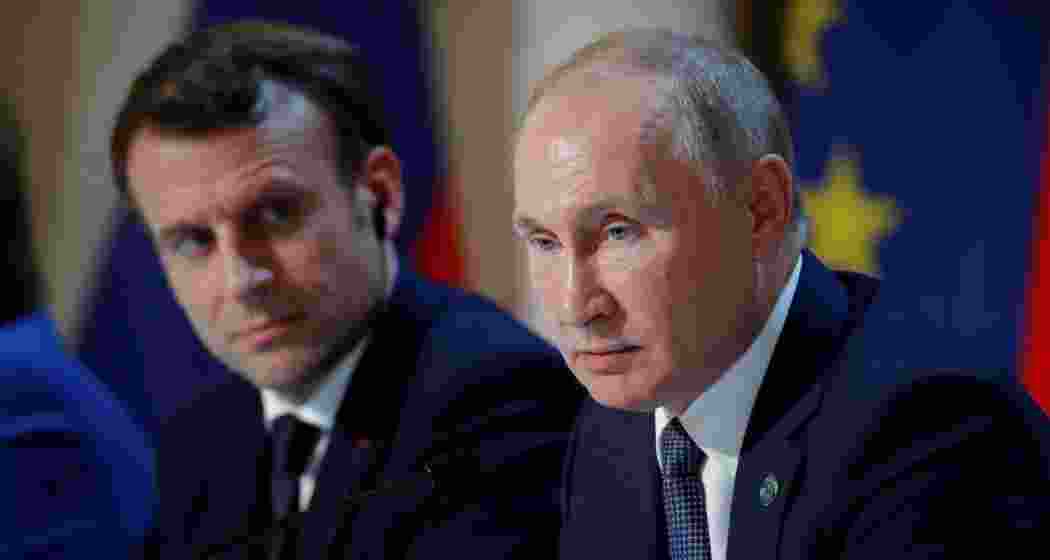 French President Emmanuel Macron and Russia's President Vladimir Putin attend a joint news conference after a Normandy-format summit in Paris, France in 2019. File photo.