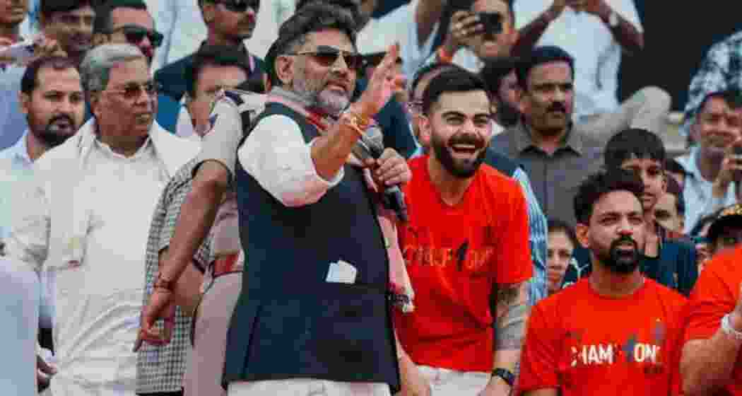 Bengaluru: Karnataka Chief Minister Siddaramaiah and Deputy Chief Minister DK Shivakumar with Royal Challengers Bengaluru's Virat Kohli and other team members during a felicitation ceremony for the team after winning the Indian Premier League (IPL) 2025, at Vidhana Soudha, in Bengaluru, Karnataka.
