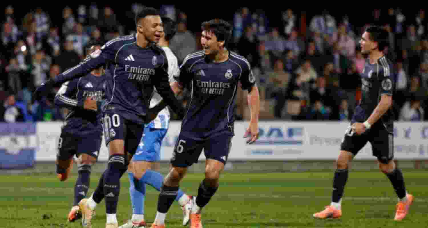 Real and Atletico Madrid claim narrow wins in Copa del Rey