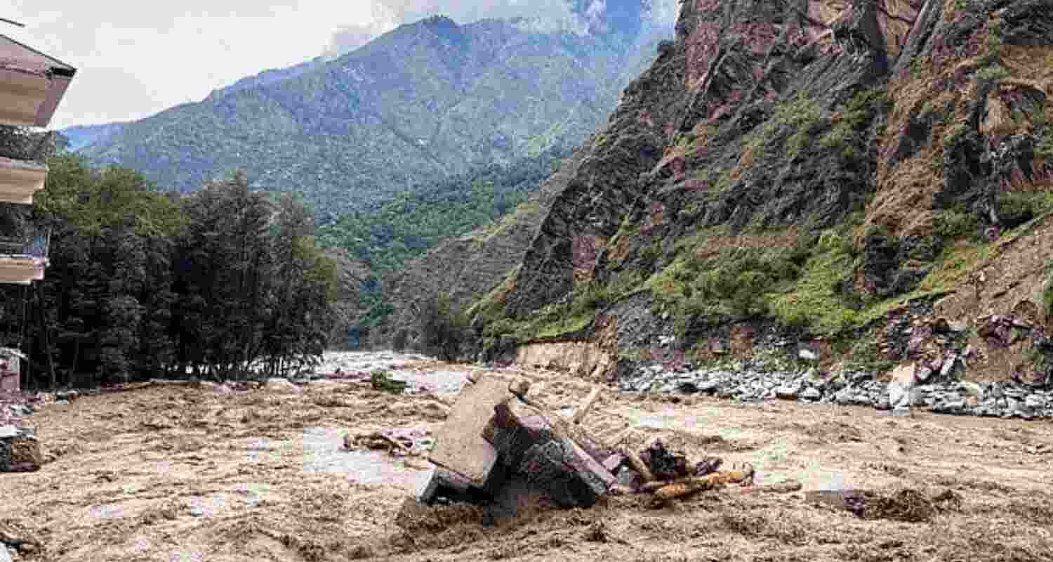 The gushing water carried huge amounts of debris, which spread across agricultural land. The gushing water carried huge amounts of debris, which spread across agricultural land.