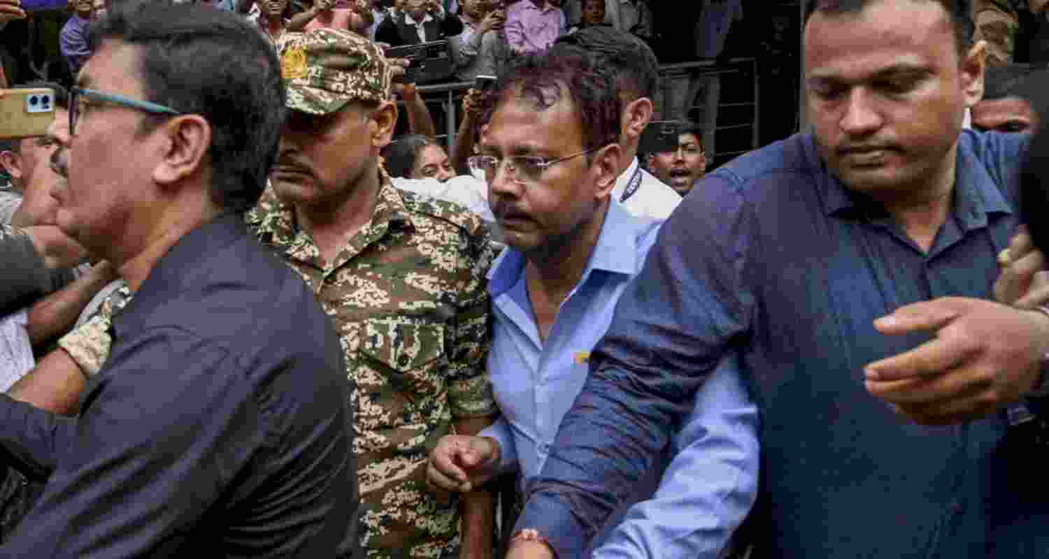 RG Kar hospital ex-principal Sandip Ghosh being taken into custody. RG Kar hospital ex-principal Sandip Ghosh being taken into custody.