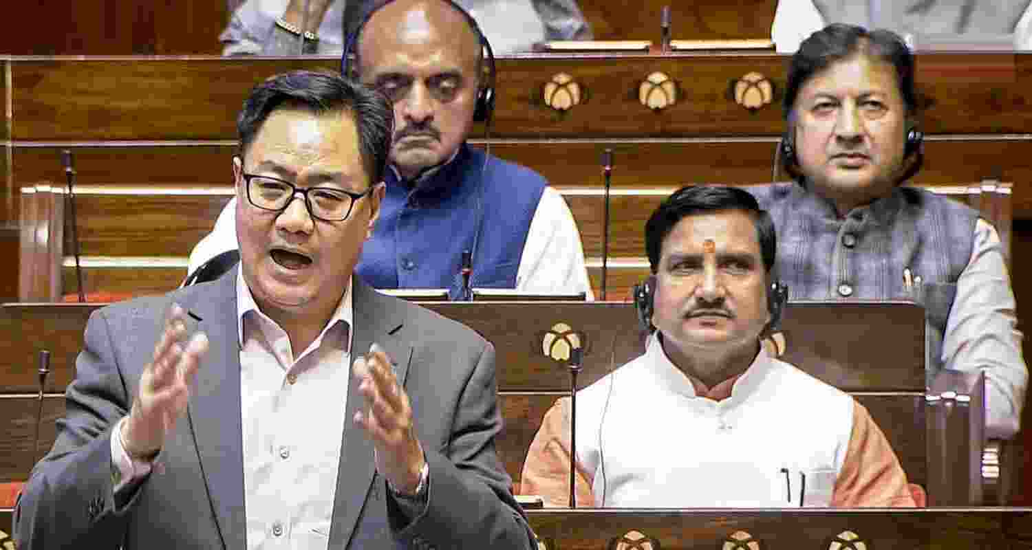 Union Minister Kiren Rijiju speaks during the Winter Session of Parliament, in New Delhi, Tuesday.