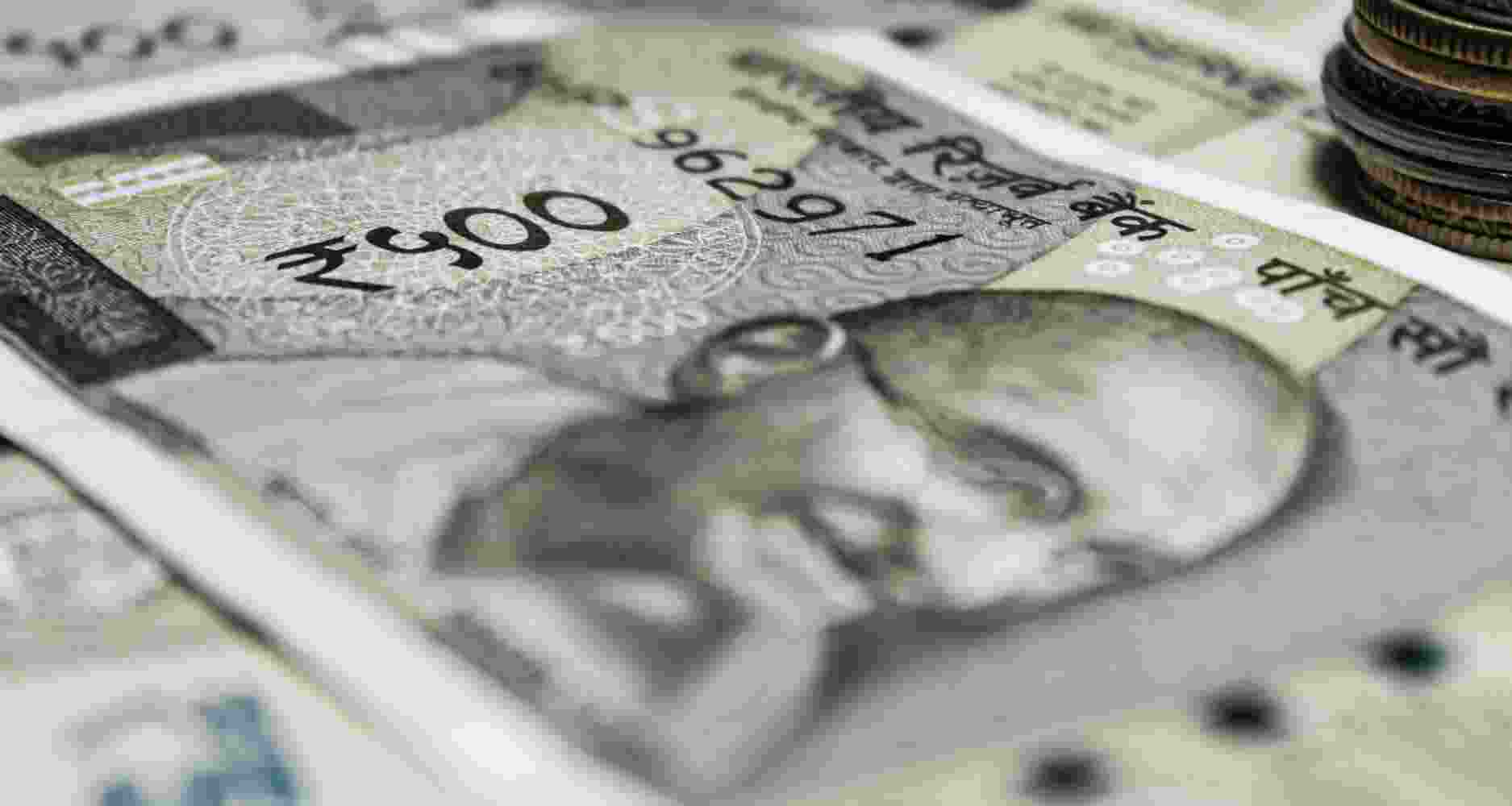 Rupee hits record low of 92.63 vs US dollar on FII outflows, strong greenback and high crude amid West Asia tensions.