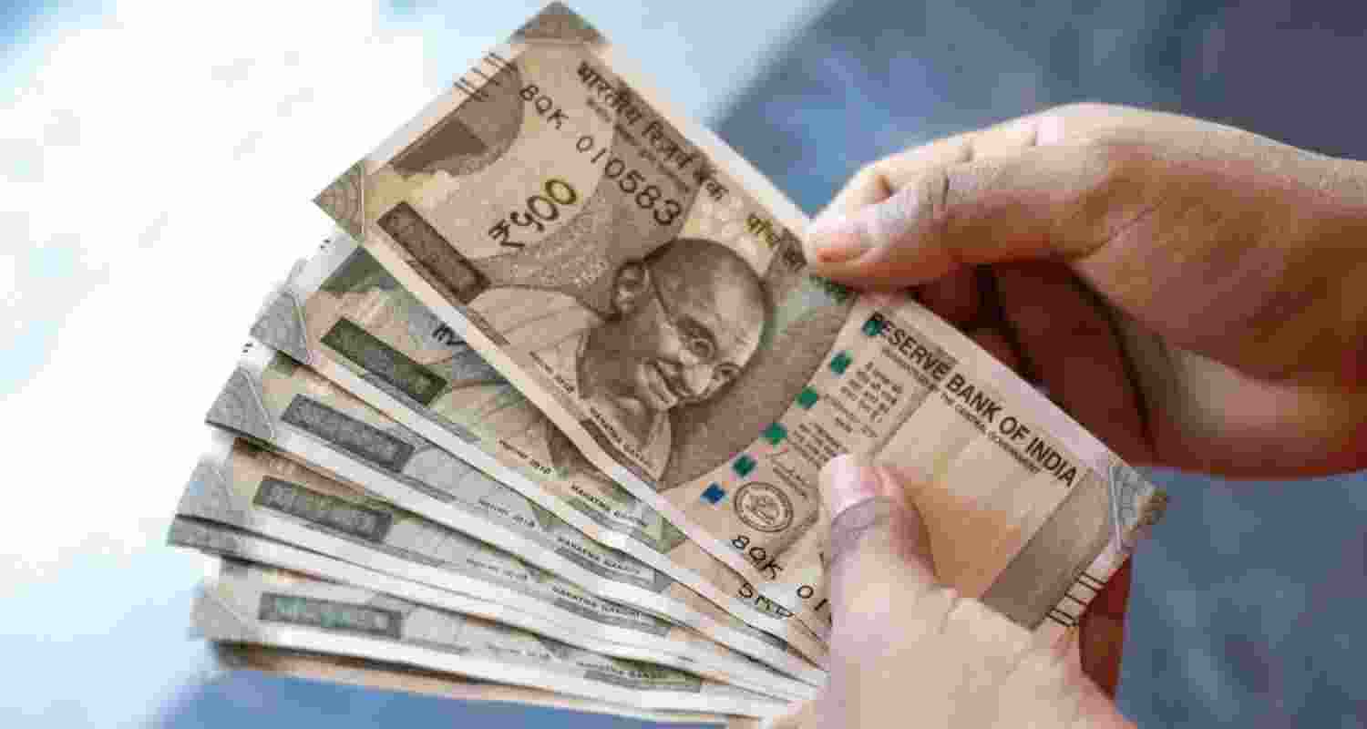 Rupee falls 7 paise, settles at 85.60 against US dollar