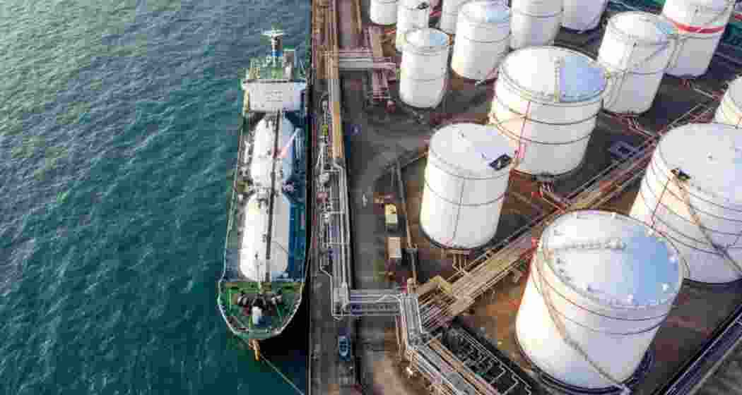 An oil tanker stationed at an Indian port terminal. 