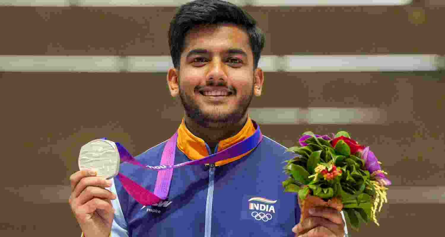 Aishwary Pratap Singh Tomar beat teammate Niraj Kumar to clinch gold with a world record.