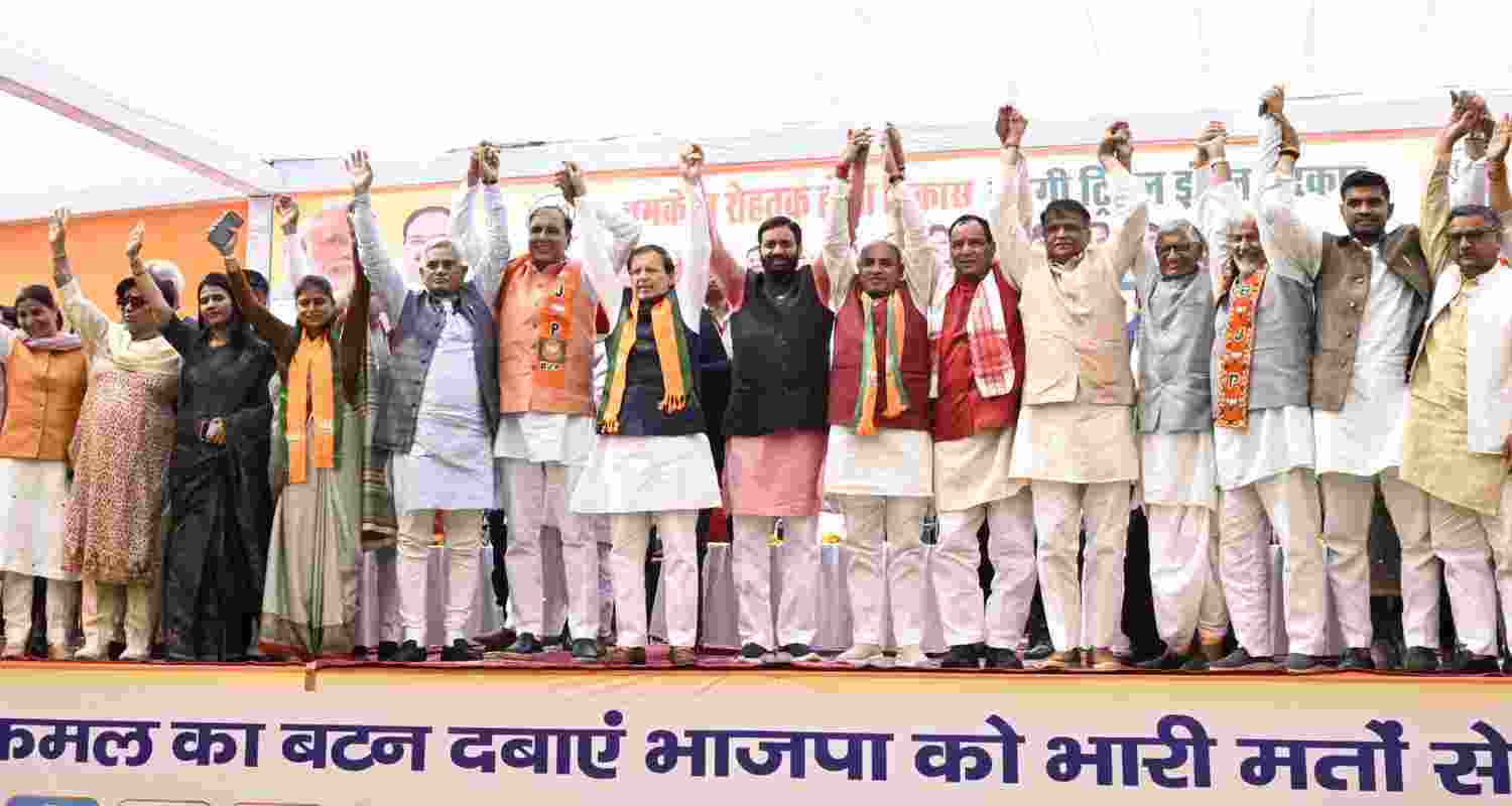 CM Saini with BJP leaders as he campaigns in support of the party candidates for Haryana's urban polls. 