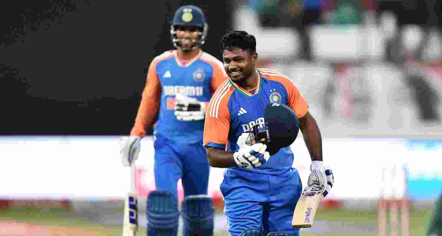 Indian opener Sanju Samson celebrates his century. Indian opener Sanju Samson celebrates his century.