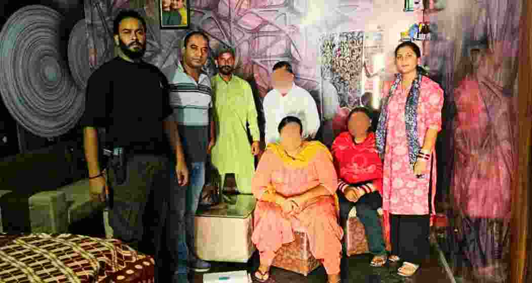 The two accused women with Nurpur Police officials after their arrest in Damtal, Kangra district, Himachal Pradesh.