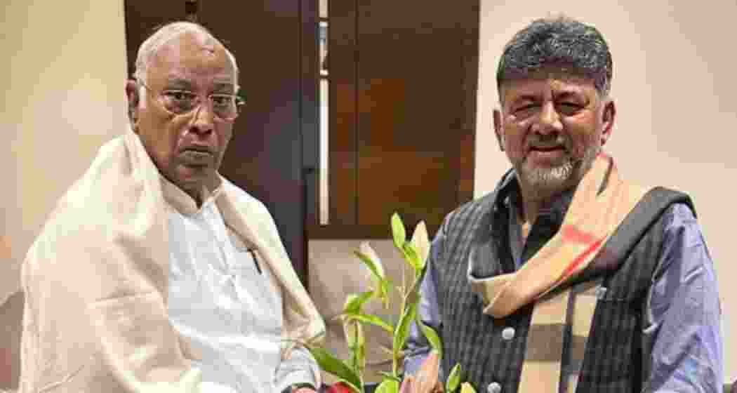 Karnataka Deputy Chief Minister D K Shivakumar with Congress President Mallikarjun Kharge in Bengaluru on Thursday.